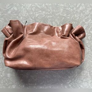 Anthropologie clam shell bag.
